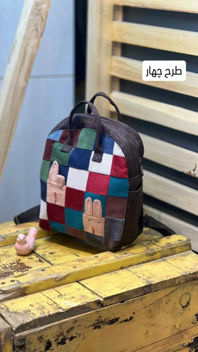 کوله پشتی نقلی دخترانه جنس پارچه ای آستر دار